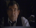 Tom Bosley looks on in the studio control room, in The Night That Panicked America
